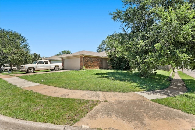 2200 Lookout Ln, Denton, TX 76207 - view of front of home featuring an attached garage, a front lawn, brick siding, and concrete driveway