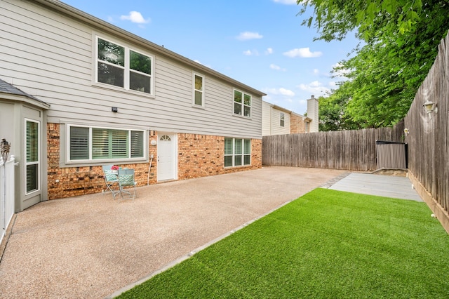 3428 Glade Creek Dr, Hurst, TX 76054 - rear view of house with a patio and brick siding