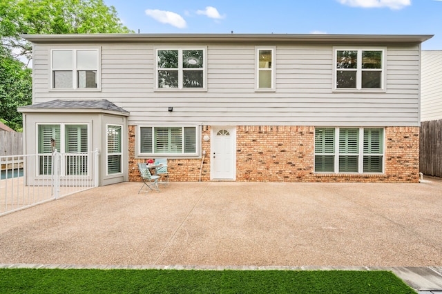 3428 Glade Creek Dr, Hurst, TX 76054 - back of house featuring a patio and brick siding