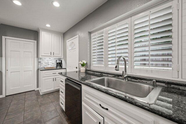 3428 Glade Creek Dr, Hurst, TX 76054 - kitchen with a sink, dishwashing machine, recessed lighting, white cabinetry, and dark tile patterned floors