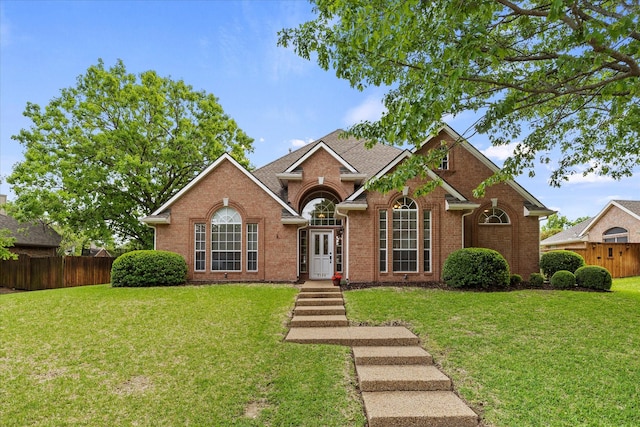 3134 Oak Dr, Rockwall, TX 75032 - traditional-style home featuring brick siding