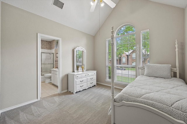 3134 Oak Dr, Rockwall, TX 75032 - bedroom with light colored carpet, high vaulted ceiling, ensuite bathroom, baseboards, and ceiling fan