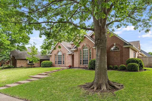 3134 Oak Dr, Rockwall, TX 75032 - traditional home featuring brick siding and roof with shingles