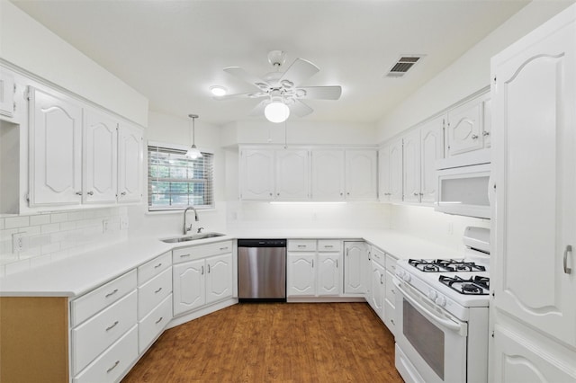 207 Johnston Blvd, Waxahachie, TX 75165 - kitchen featuring white appliances, a sink, white cabinets, ceiling fan, and decorative backsplash