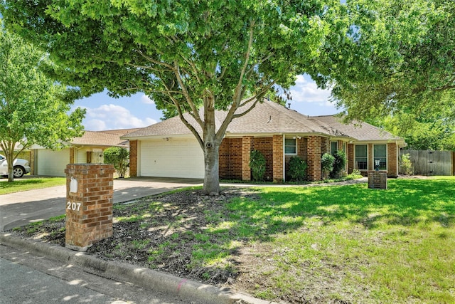 207 Johnston Blvd, Waxahachie, TX 75165 - single story home with a garage, concrete driveway, a shingled roof, and brick siding