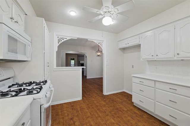 207 Johnston Blvd, Waxahachie, TX 75165 - kitchen with white appliances, a ceiling fan, white cabinetry, decorative backsplash, and light countertops