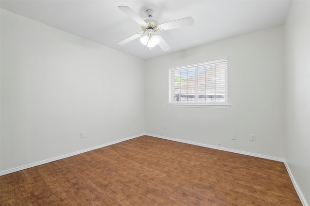 207 Johnston Blvd, Waxahachie, TX 75165 - spare room featuring wood finished floors, baseboards, and a ceiling fan