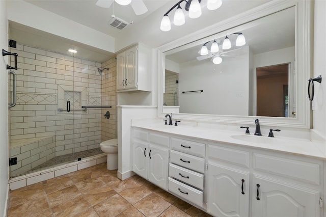 207 Johnston Blvd, Waxahachie, TX 75165 - bathroom with ceiling fan, double vanity, a shower stall, toilet, and tile patterned floors