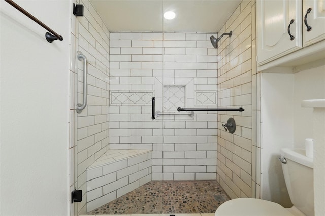 207 Johnston Blvd, Waxahachie, TX 75165 - bathroom featuring toilet, a stall shower, and recessed lighting