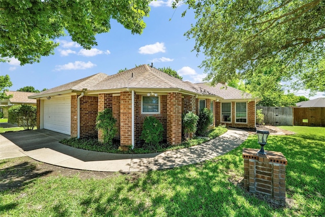 207 Johnston Blvd, Waxahachie, TX 75165 - ranch-style home featuring brick siding, a garage, and concrete driveway