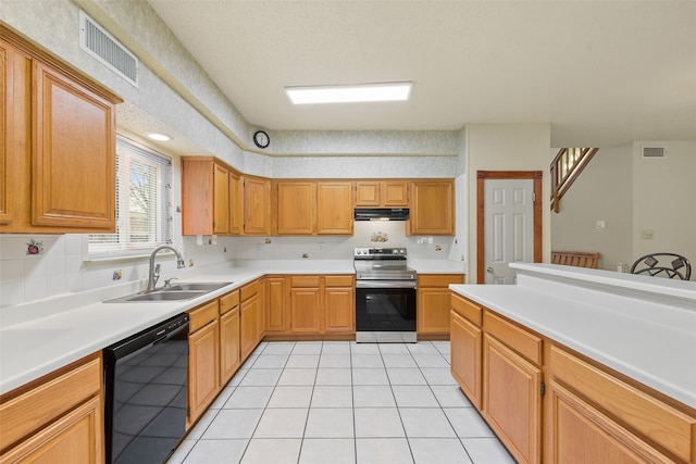 2207 Villanova St, Arlington, TX 76018 - kitchen with stainless steel electric range, black dishwasher, a sink, under cabinet range hood, and light tile patterned floors