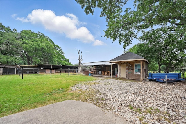 11514 Oakfield Dr, Balch Springs, TX 75180 - view of yard with an exterior structure and an outdoor structure