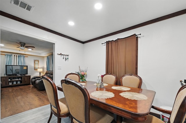 11514 Oakfield Dr, Balch Springs, TX 75180 - dining area with wood finished floors, a ceiling fan, and recessed lighting
