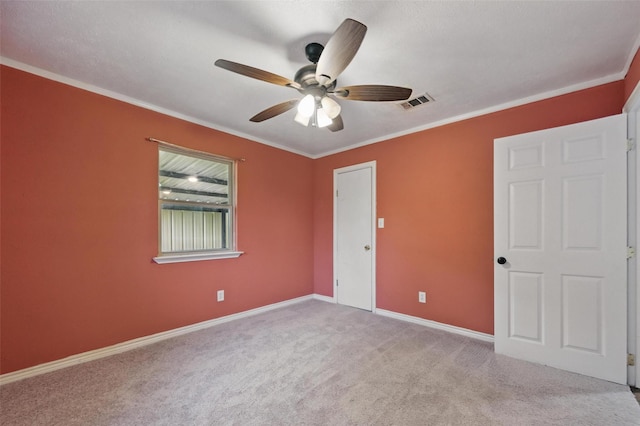 11514 Oakfield Dr, Balch Springs, TX 75180 - unfurnished bedroom featuring carpet floors, baseboards, crown molding, and a ceiling fan