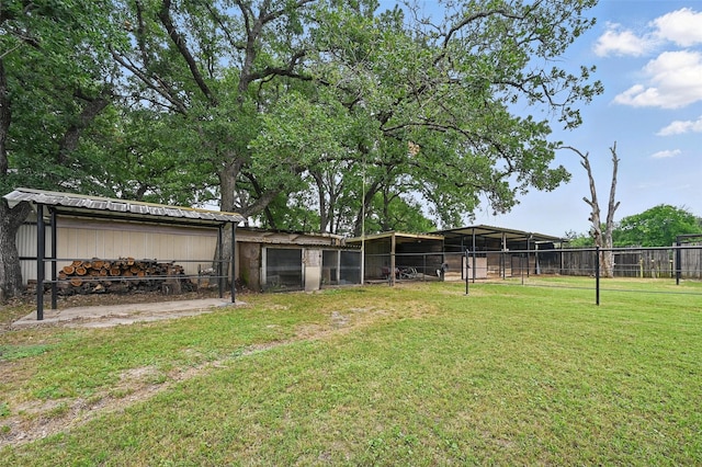 11514 Oakfield Dr, Balch Springs, TX 75180 - view of yard featuring an outdoor structure