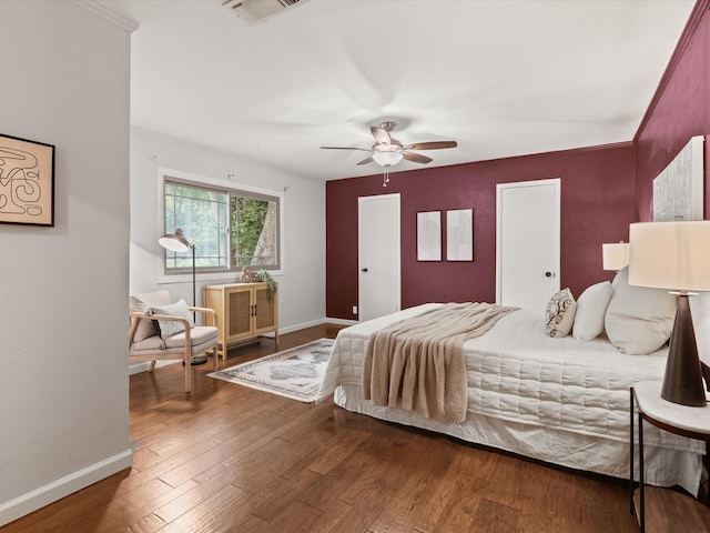 5217 Blue Valley Ct, Fort Worth, TX 76112 - bedroom featuring wood finished floors, baseboards, and ceiling fan
