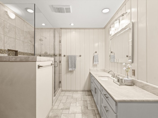 5217 Blue Valley Ct, Fort Worth, TX 76112 - bathroom with vanity, a shower stall, recessed lighting, and stone finish flooring