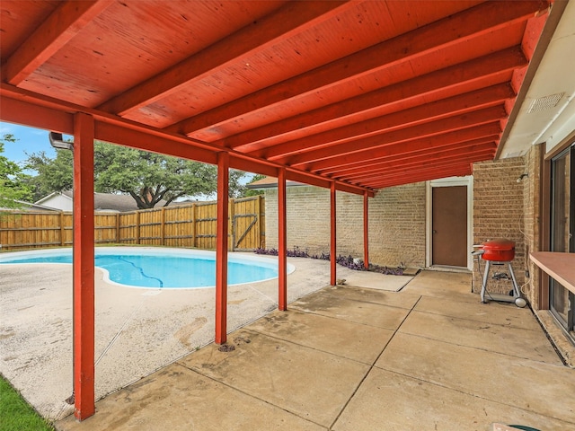 3146 Oak Hill Rd, Carrollton, TX 75007 - view of pool with a fenced backyard and a patio