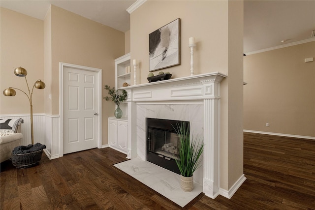 6233 Roaring Springs Dr, North Richland Hills, TX 76180 - unfurnished living room featuring dark wood-type flooring, a fireplace, and crown molding