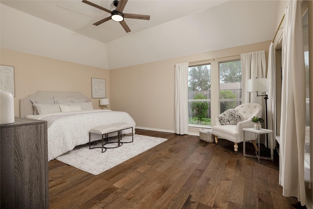 6233 Roaring Springs Dr, North Richland Hills, TX 76180 - bedroom with dark wood finished floors, lofted ceiling, baseboards, and a ceiling fan
