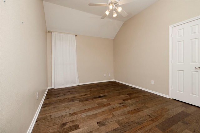 6233 Roaring Springs Dr, North Richland Hills, TX 76180 - unfurnished bedroom with dark wood-type flooring, lofted ceiling, baseboards, and ceiling fan