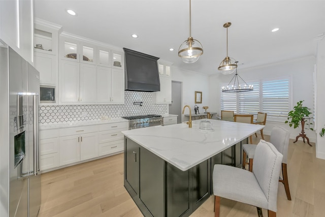 277 Schneider Rd, Sherman, TX 75090 - kitchen with appliances with stainless steel finishes, premium range hood, backsplash, light wood-type flooring, and crown molding