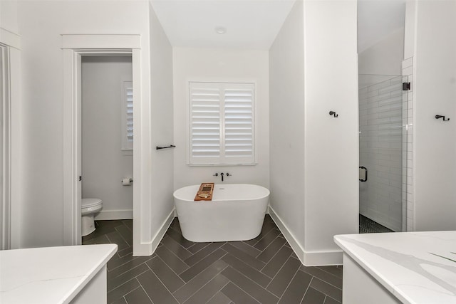 277 Schneider Rd, Sherman, TX 75090 - bathroom with vanity, a freestanding bath, a stall shower, and baseboards
