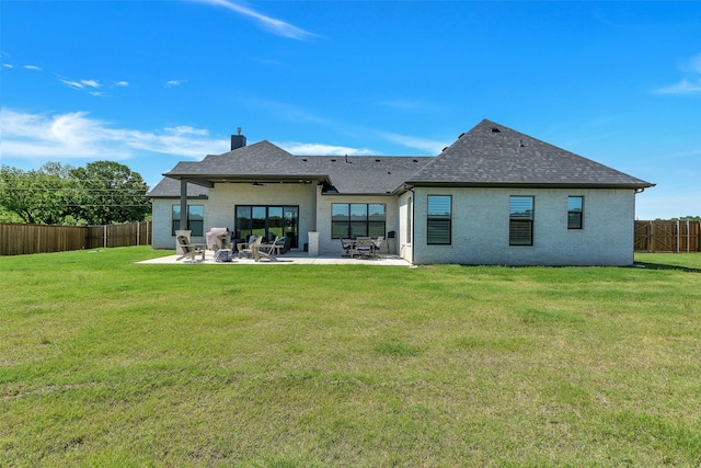277 Schneider Rd, Sherman, TX 75090 - back of house featuring a patio area, a shingled roof, a chimney, ceiling fan, and brick siding