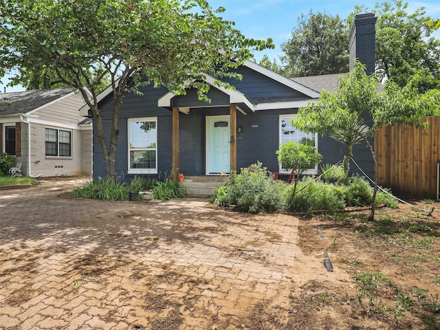 2522 W Jefferson Blvd, Dallas, TX 75211 - view of front of home featuring brick siding and a chimney