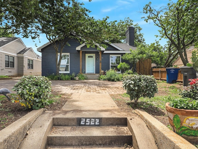 2522 W Jefferson Blvd, Dallas, TX 75211 - bungalow with brick siding and a chimney