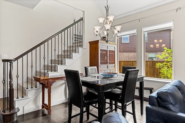 2712 Cross Oak Pl, Mckinney, TX 75071 - dining space with a chandelier, wood finished floors, stairs, and baseboards