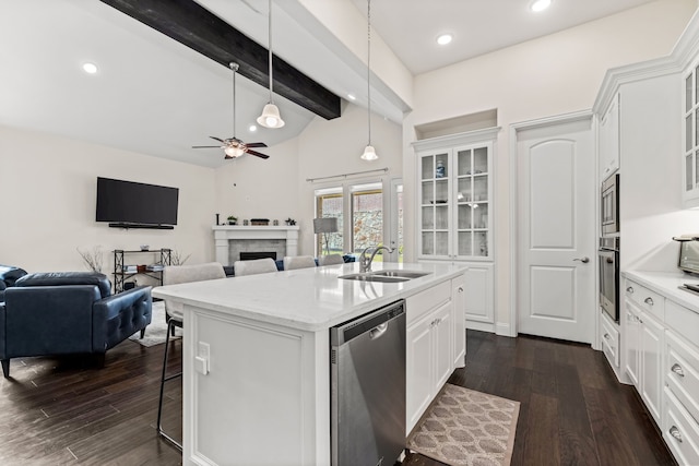 2712 Cross Oak Pl, Mckinney, TX 75071 - kitchen featuring stainless steel appliances, a sink, dark wood-type flooring, a breakfast bar, and recessed lighting