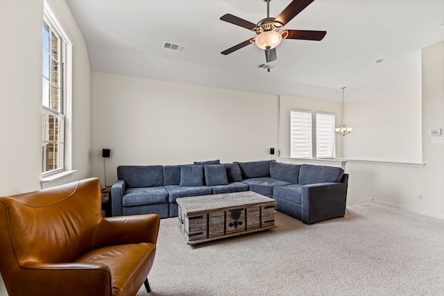 2712 Cross Oak Pl, Mckinney, TX 75071 - carpeted living area with a chandelier, ceiling fan, and baseboards