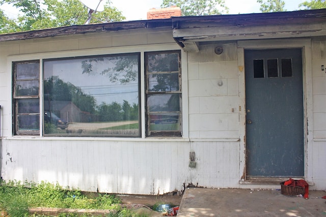 601 S Colorado St, Whitney, TX 76692 - property entrance with a chimney