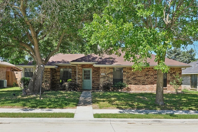6319 Leasa Ct, Sachse, TX 75048 - ranch-style home featuring brick siding, central AC, and a front lawn