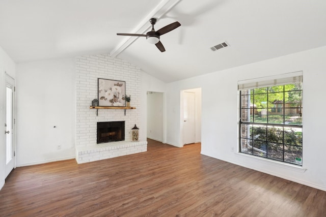 6319 Leasa Ct, Sachse, TX 75048 - unfurnished living room featuring a ceiling fan, wood finished floors, a brick fireplace, and baseboards