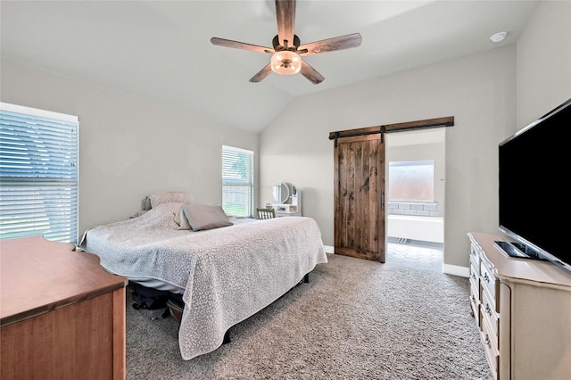 4817 Enclave Dr, Sanger, TX 76266 - carpeted bedroom with a barn door, vaulted ceiling, ceiling fan, baseboards, and ensuite bath