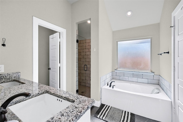 4817 Enclave Dr, Sanger, TX 76266 - full bath with a shower stall, a garden tub, double vanity, tile patterned floors, and recessed lighting