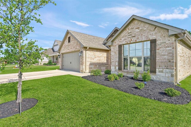 4817 Enclave Dr, Sanger, TX 76266 - view of front of house with brick siding, a front lawn, an attached garage, and stone siding