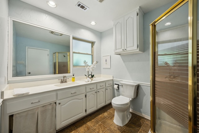 4309 Bilglade Rd, Fort Worth, TX 76109 - bathroom featuring vanity, toilet, a shower stall, recessed lighting, and tile patterned flooring