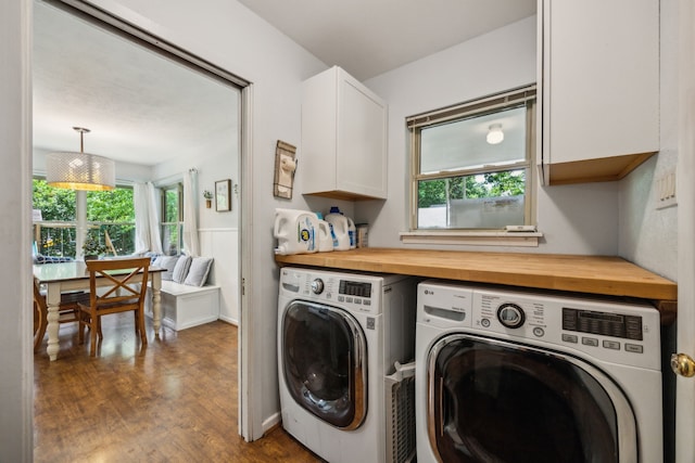 4309 Bilglade Rd, Fort Worth, TX 76109 - laundry area featuring cabinet space, separate washer and dryer, wood finished floors, and plenty of natural light