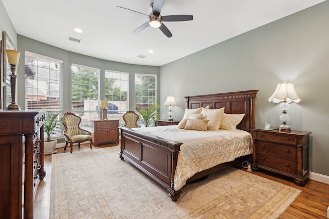 15198 Woodbluff Dr, Frisco, TX 75035 - bedroom featuring light wood-style flooring, recessed lighting, ceiling fan, and baseboards