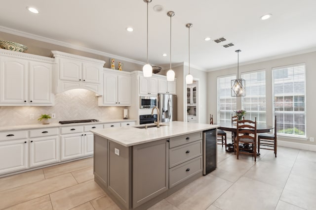 15198 Woodbluff Dr, Frisco, TX 75035 - kitchen featuring gray cabinets, appliances with stainless steel finishes, wine cooler, a sink, and white cabinets