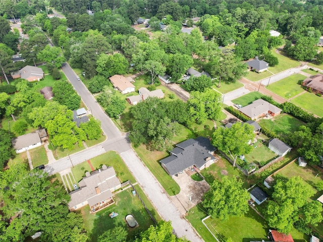 1101 N Bledsoe St, Gilmer, TX 75644 - aerial view of property and surrounding area with nearby suburban area