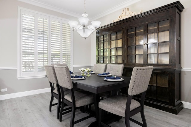 414 Long Cove Dr, Fairview, TX 75069 - dining room featuring a chandelier, ornamental molding, light wood-style flooring, and baseboards