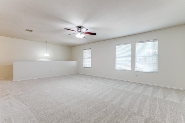 1337 Red River Ln, Allen, TX 75002 - empty room with a ceiling fan, light colored carpet, and baseboards