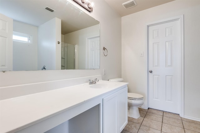 1337 Red River Ln, Allen, TX 75002 - bathroom with toilet, tile patterned floors, vanity, and an enclosed shower
