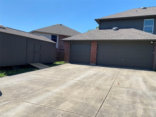 1337 Red River Ln, Allen, TX 75002 - view of side of property with concrete driveway, a garage, brick siding, and a shingled roof