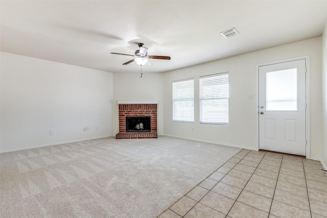 1337 Red River Ln, Allen, TX 75002 - unfurnished living room with ceiling fan, a brick fireplace, light carpet, and baseboards