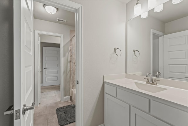 3456 Begonia Ln, Irving, TX 75038 - bathroom with vanity, tile patterned flooring, and shower / bath combo